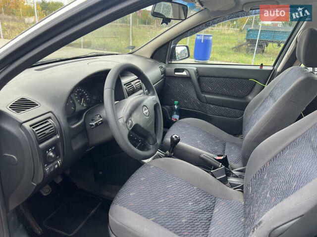 Серый Опель Астра, объемом двигателя 2 л и пробегом 400 тыс. км за 3250 $, фото 13 на Automoto.ua