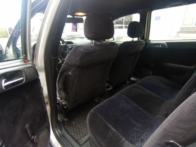 Серый Опель Астра, объемом двигателя 2 л и пробегом 400 тыс. км за 2800 $, фото 4 на Automoto.ua