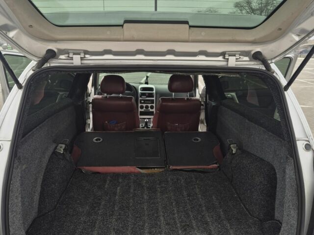 Серый Опель Астра, объемом двигателя 1.4 л и пробегом 349 тыс. км за 3300 $, фото 6 на Automoto.ua