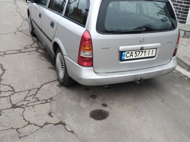 Серый Опель Астра, объемом двигателя 1.4 л и пробегом 250 тыс. км за 2399 $, фото 2 на Automoto.ua