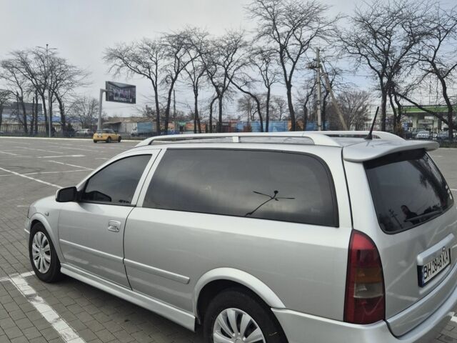 Серый Опель Астра, объемом двигателя 1.4 л и пробегом 349 тыс. км за 3300 $, фото 10 на Automoto.ua