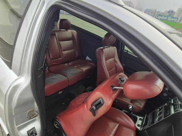 Серый Опель Астра, объемом двигателя 1.4 л и пробегом 349 тыс. км за 3300 $, фото 13 на Automoto.ua