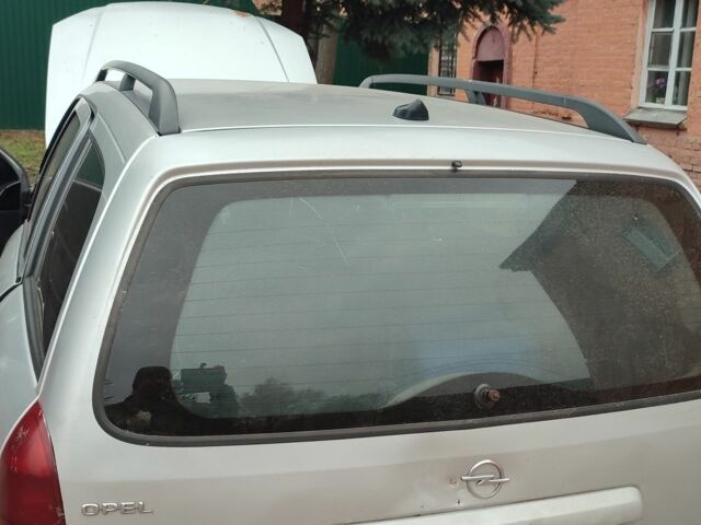 Серый Опель Астра, объемом двигателя 2 л и пробегом 400 тыс. км за 1312 $, фото 4 на Automoto.ua