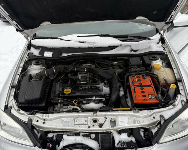 Серый Опель Астра, объемом двигателя 1.7 л и пробегом 220 тыс. км за 3500 $, фото 29 на Automoto.ua