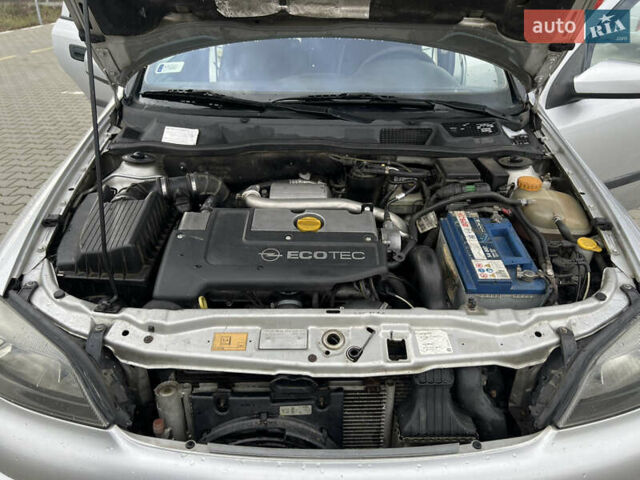 Серый Опель Астра, объемом двигателя 2 л и пробегом 400 тыс. км за 3250 $, фото 26 на Automoto.ua