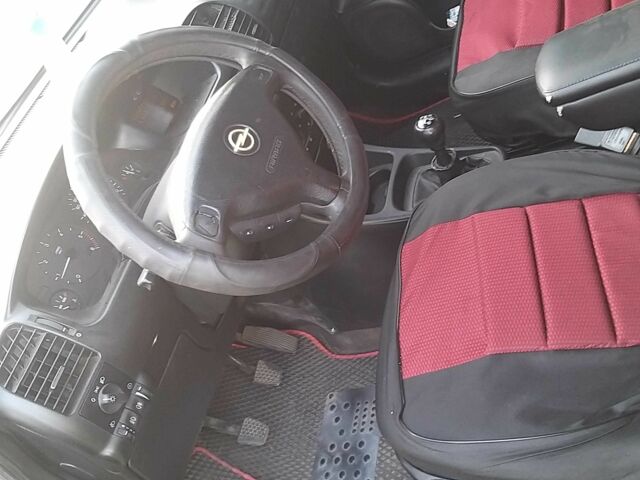 Серый Опель Астра, объемом двигателя 2 л и пробегом 287 тыс. км за 4500 $, фото 3 на Automoto.ua