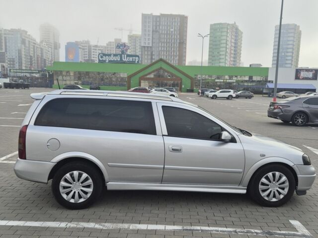 Серый Опель Астра, объемом двигателя 1.4 л и пробегом 349 тыс. км за 3300 $, фото 3 на Automoto.ua