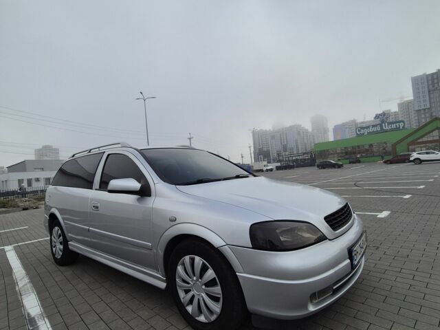 Серый Опель Астра, объемом двигателя 1.4 л и пробегом 349 тыс. км за 3300 $, фото 2 на Automoto.ua