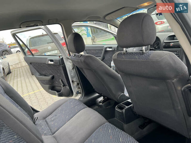 Серый Опель Астра, объемом двигателя 2 л и пробегом 400 тыс. км за 3250 $, фото 25 на Automoto.ua