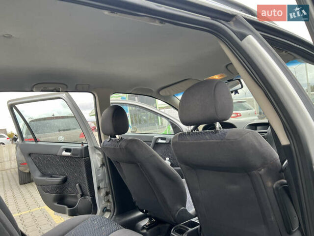 Серый Опель Астра, объемом двигателя 2 л и пробегом 400 тыс. км за 3250 $, фото 23 на Automoto.ua