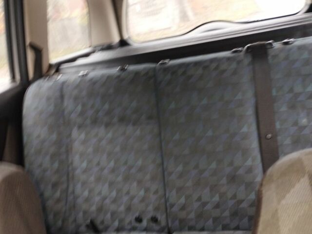 Серый Опель Астра, объемом двигателя 1.4 л и пробегом 250 тыс. км за 2399 $, фото 5 на Automoto.ua