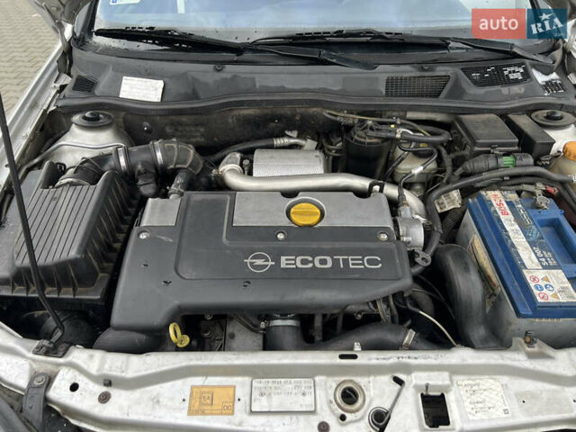 Серый Опель Астра, объемом двигателя 2 л и пробегом 400 тыс. км за 3250 $, фото 27 на Automoto.ua