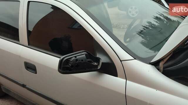 Серый Опель Астра, объемом двигателя 2 л и пробегом 400 тыс. км за 1400 $, фото 5 на Automoto.ua