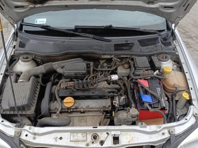 Серый Опель Астра, объемом двигателя 1.4 л и пробегом 250 тыс. км за 2399 $, фото 6 на Automoto.ua