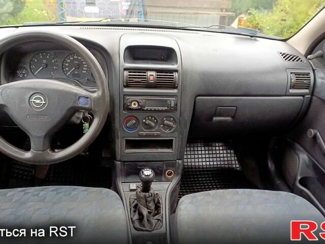 Серый Опель Астра, объемом двигателя 1.4 л и пробегом 340 тыс. км за 2249 $, фото 3 на Automoto.ua