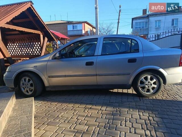 Серый Опель Астра, объемом двигателя 1.6 л и пробегом 216 тыс. км за 3200 $, фото 6 на Automoto.ua