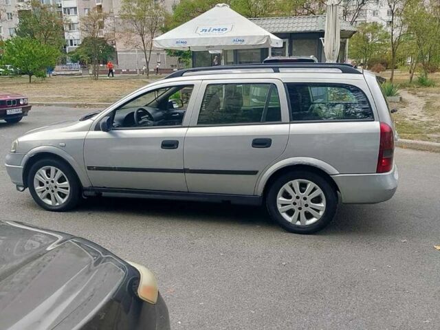 Сірий Опель Астра, об'ємом двигуна 2 л та пробігом 241 тис. км за 1850 $, фото 4 на Automoto.ua