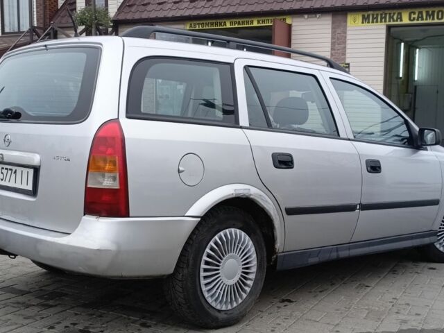 Серый Опель Астра, объемом двигателя 1.4 л и пробегом 250 тыс. км за 2399 $, фото 7 на Automoto.ua