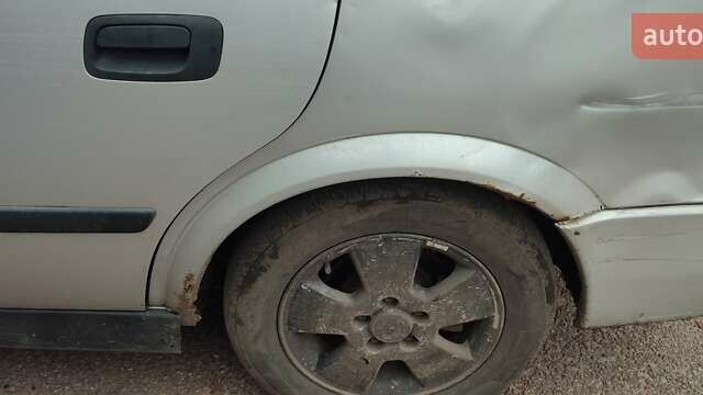 Серый Опель Астра, объемом двигателя 2 л и пробегом 400 тыс. км за 1400 $, фото 4 на Automoto.ua