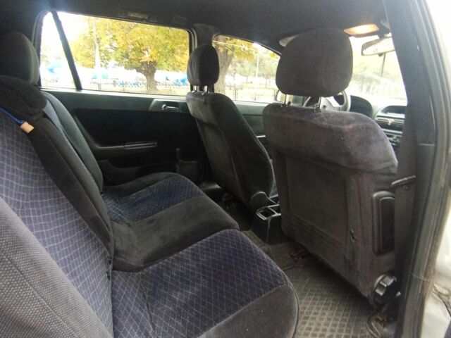 Серый Опель Астра, объемом двигателя 2 л и пробегом 400 тыс. км за 2800 $, фото 5 на Automoto.ua