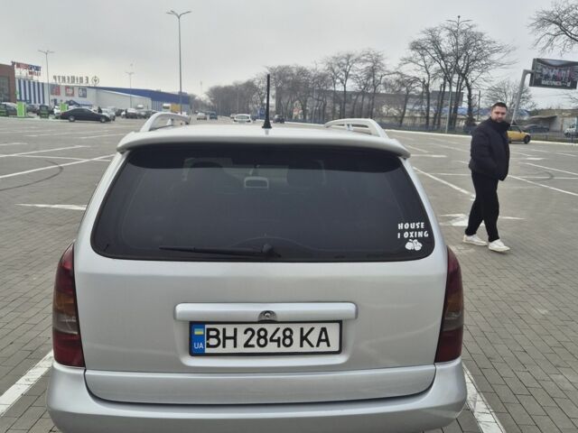 Серый Опель Астра, объемом двигателя 1.4 л и пробегом 349 тыс. км за 3300 $, фото 11 на Automoto.ua