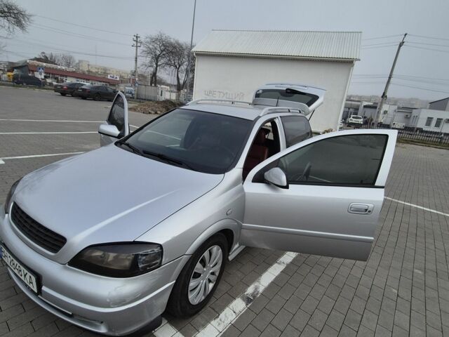 Серый Опель Астра, объемом двигателя 1.4 л и пробегом 349 тыс. км за 3300 $, фото 1 на Automoto.ua