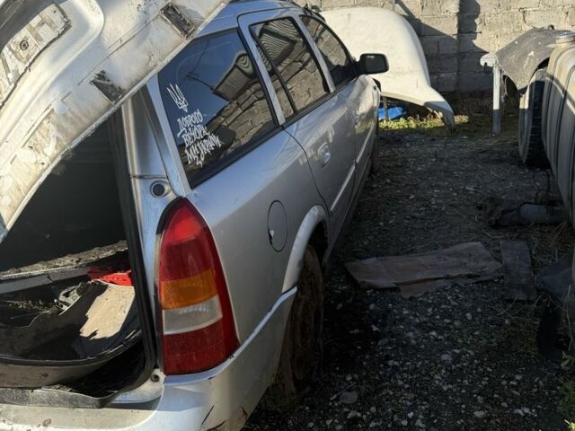 Серый Опель Астра, объемом двигателя 1.7 л и пробегом 300 тыс. км за 592 $, фото 1 на Automoto.ua