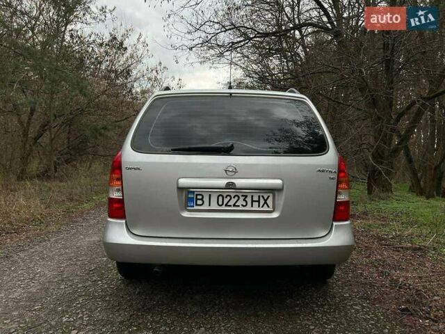 Серый Опель Астра, объемом двигателя 1.6 л и пробегом 123 тыс. км за 3900 $, фото 4 на Automoto.ua