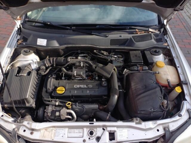 Серый Опель Астра, объемом двигателя 1.8 л и пробегом 329 тыс. км за 3355 $, фото 11 на Automoto.ua
