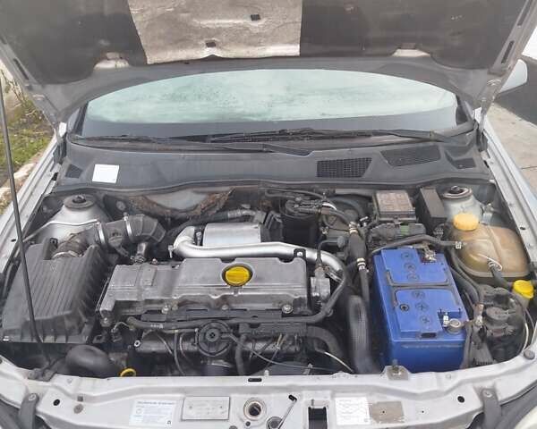 Серый Опель Астра, объемом двигателя 2 л и пробегом 403 тыс. км за 2600 $, фото 17 на Automoto.ua