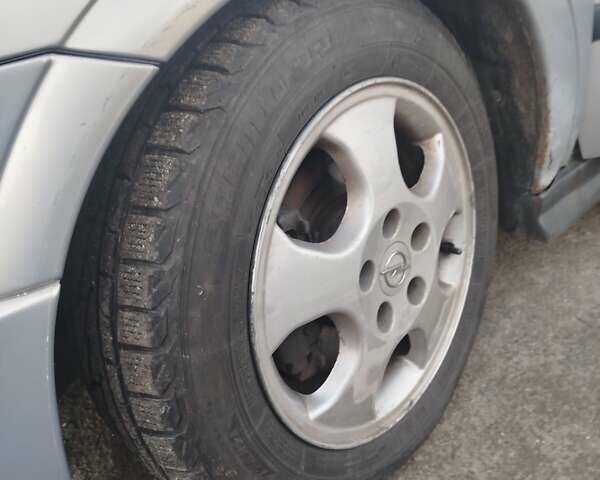 Серый Опель Астра, объемом двигателя 2 л и пробегом 403 тыс. км за 2600 $, фото 8 на Automoto.ua