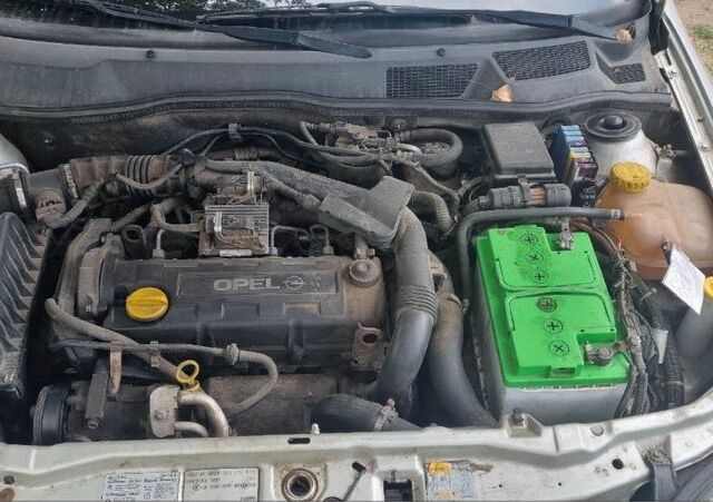 Серый Опель Астра, объемом двигателя 1.7 л и пробегом 250 тыс. км за 1500 $, фото 6 на Automoto.ua
