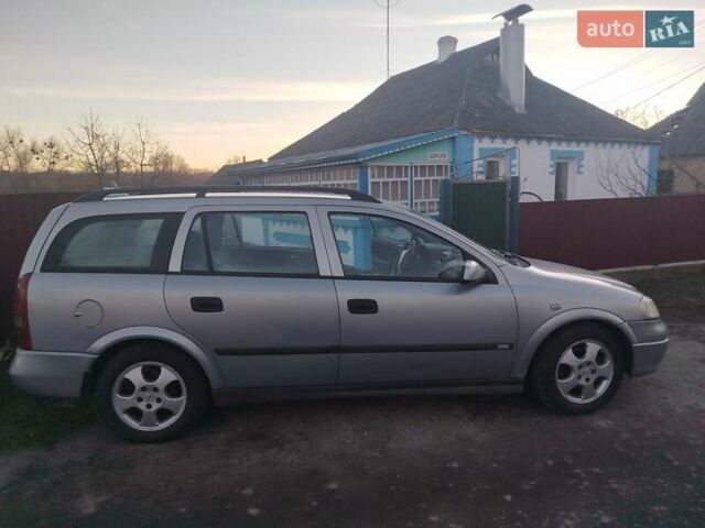 Серый Опель Астра, объемом двигателя 2 л и пробегом 403 тыс. км за 2600 $, фото 2 на Automoto.ua