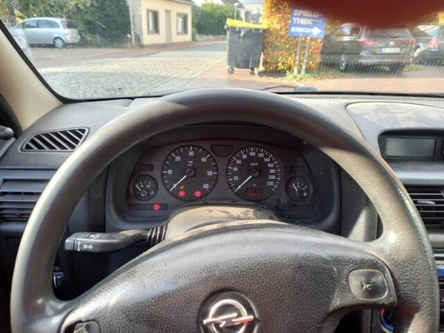 Серый Опель Астра, объемом двигателя 1.8 л и пробегом 329 тыс. км за 3355 $, фото 8 на Automoto.ua