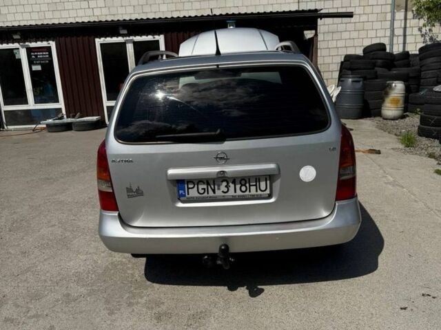 Серый Опель Астра, объемом двигателя 1.6 л и пробегом 290 тыс. км за 1165 $, фото 2 на Automoto.ua