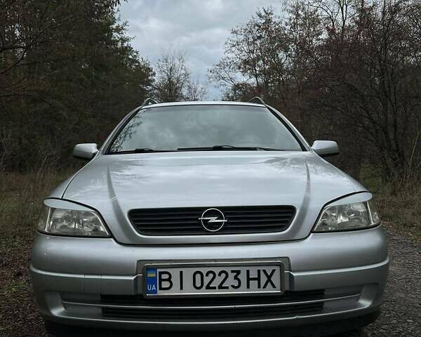 Серый Опель Астра, объемом двигателя 1.6 л и пробегом 123 тыс. км за 3900 $, фото 8 на Automoto.ua