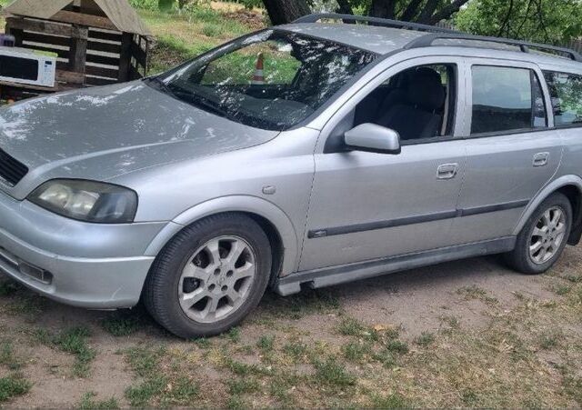 Серый Опель Астра, объемом двигателя 1.7 л и пробегом 250 тыс. км за 1500 $, фото 1 на Automoto.ua