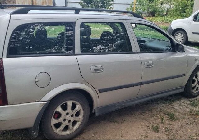 Серый Опель Астра, объемом двигателя 1.7 л и пробегом 250 тыс. км за 1500 $, фото 3 на Automoto.ua