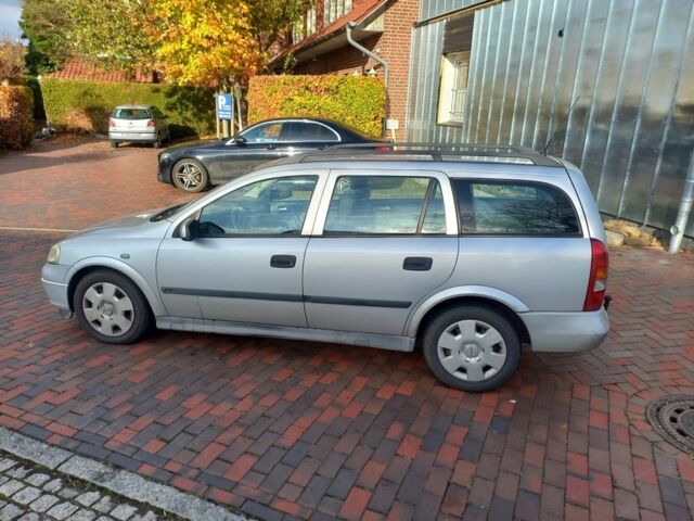 Серый Опель Астра, объемом двигателя 1.8 л и пробегом 329 тыс. км за 3355 $, фото 2 на Automoto.ua