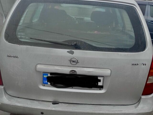 Сірий Опель Астра, об'ємом двигуна 2 л та пробігом 311 тис. км за 3100 $, фото 6 на Automoto.ua