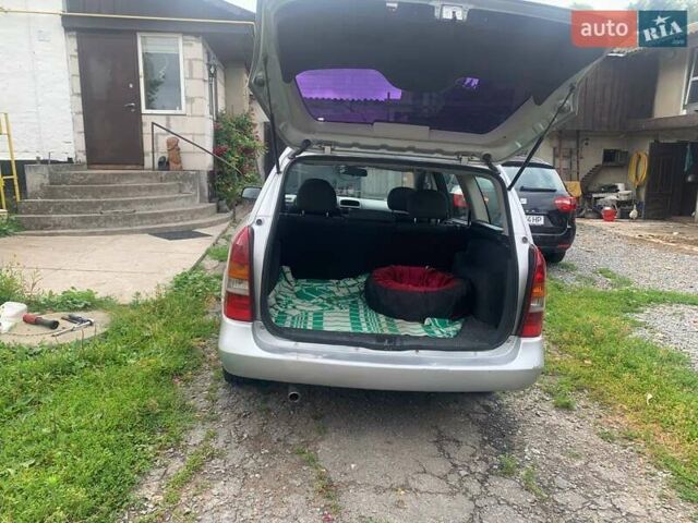 Серый Опель Астра, объемом двигателя 1.6 л и пробегом 242 тыс. км за 3800 $, фото 4 на Automoto.ua