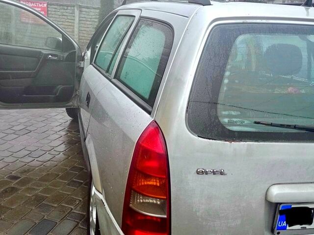 Сірий Опель Астра, об'ємом двигуна 2 л та пробігом 311 тис. км за 3100 $, фото 8 на Automoto.ua
