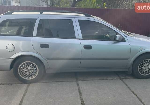 Серый Опель Астра, объемом двигателя 1.6 л и пробегом 190 тыс. км за 3400 $, фото 3 на Automoto.ua