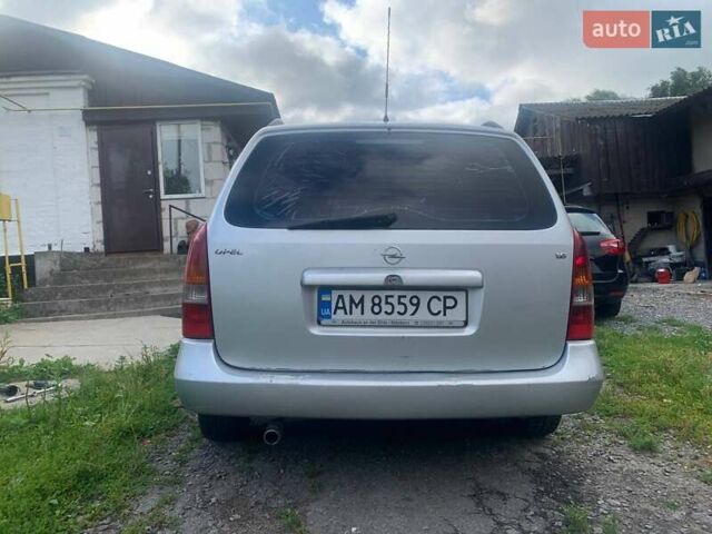 Серый Опель Астра, объемом двигателя 1.6 л и пробегом 242 тыс. км за 3800 $, фото 3 на Automoto.ua