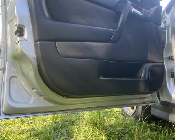 Серый Опель Астра, объемом двигателя 2 л и пробегом 223 тыс. км за 3500 $, фото 8 на Automoto.ua