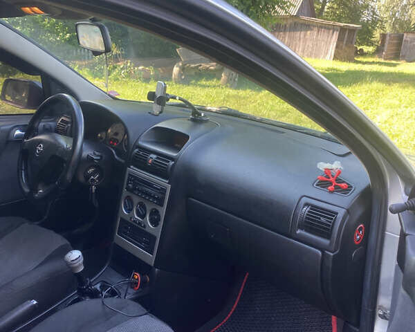 Серый Опель Астра, объемом двигателя 2 л и пробегом 223 тыс. км за 3500 $, фото 6 на Automoto.ua