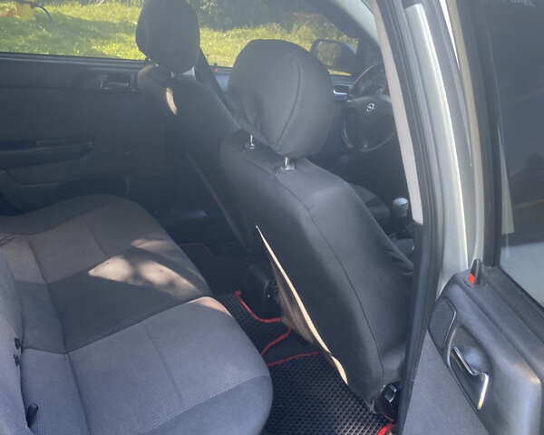 Серый Опель Астра, объемом двигателя 2 л и пробегом 223 тыс. км за 3500 $, фото 12 на Automoto.ua