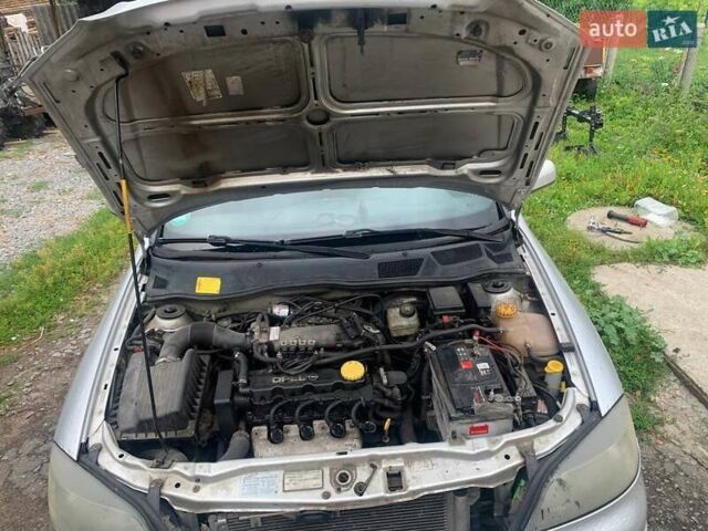 Серый Опель Астра, объемом двигателя 1.6 л и пробегом 242 тыс. км за 3800 $, фото 8 на Automoto.ua