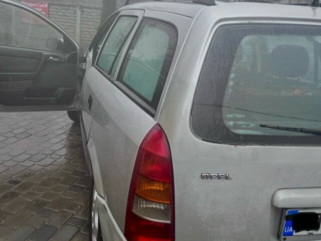 Сірий Опель Астра, об'ємом двигуна 2 л та пробігом 311 тис. км за 3100 $, фото 7 на Automoto.ua