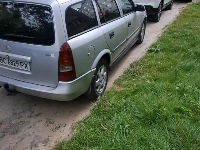 Серый Опель Астра, объемом двигателя 2 л и пробегом 366 тыс. км за 2499 $, фото 1 на Automoto.ua